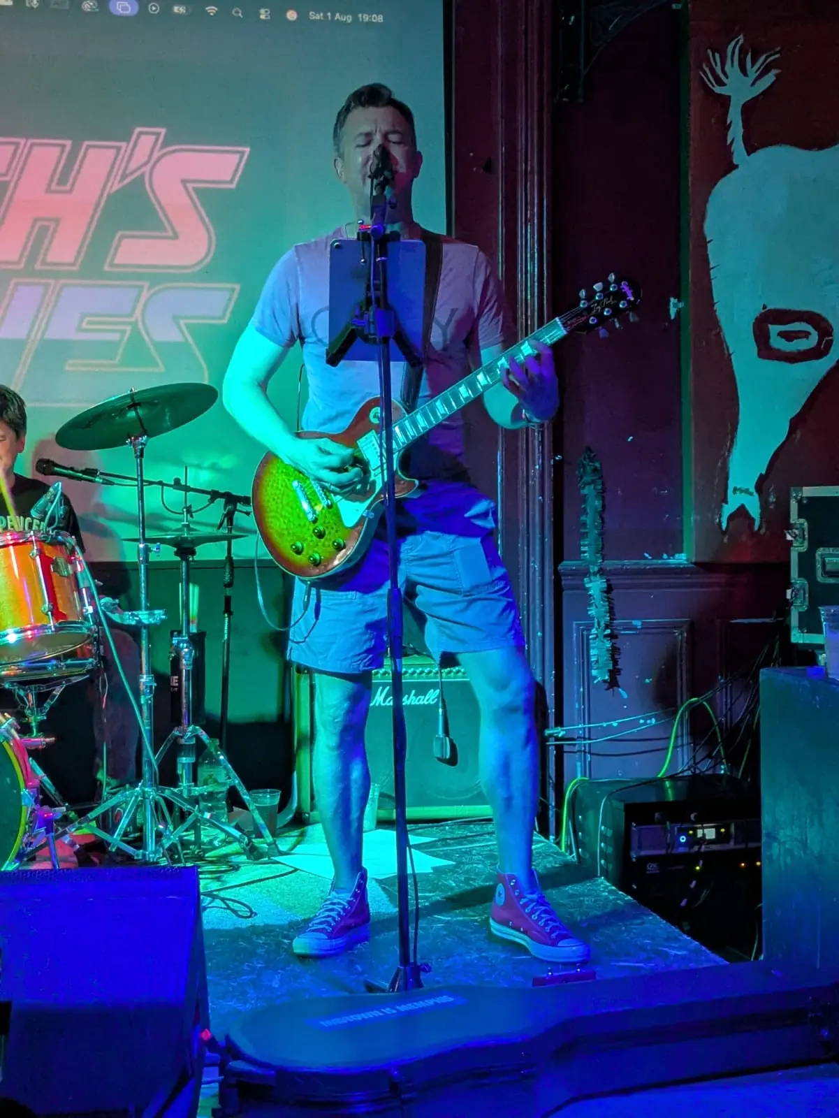 Rory singing and playing guitar for Mitch's Bitches