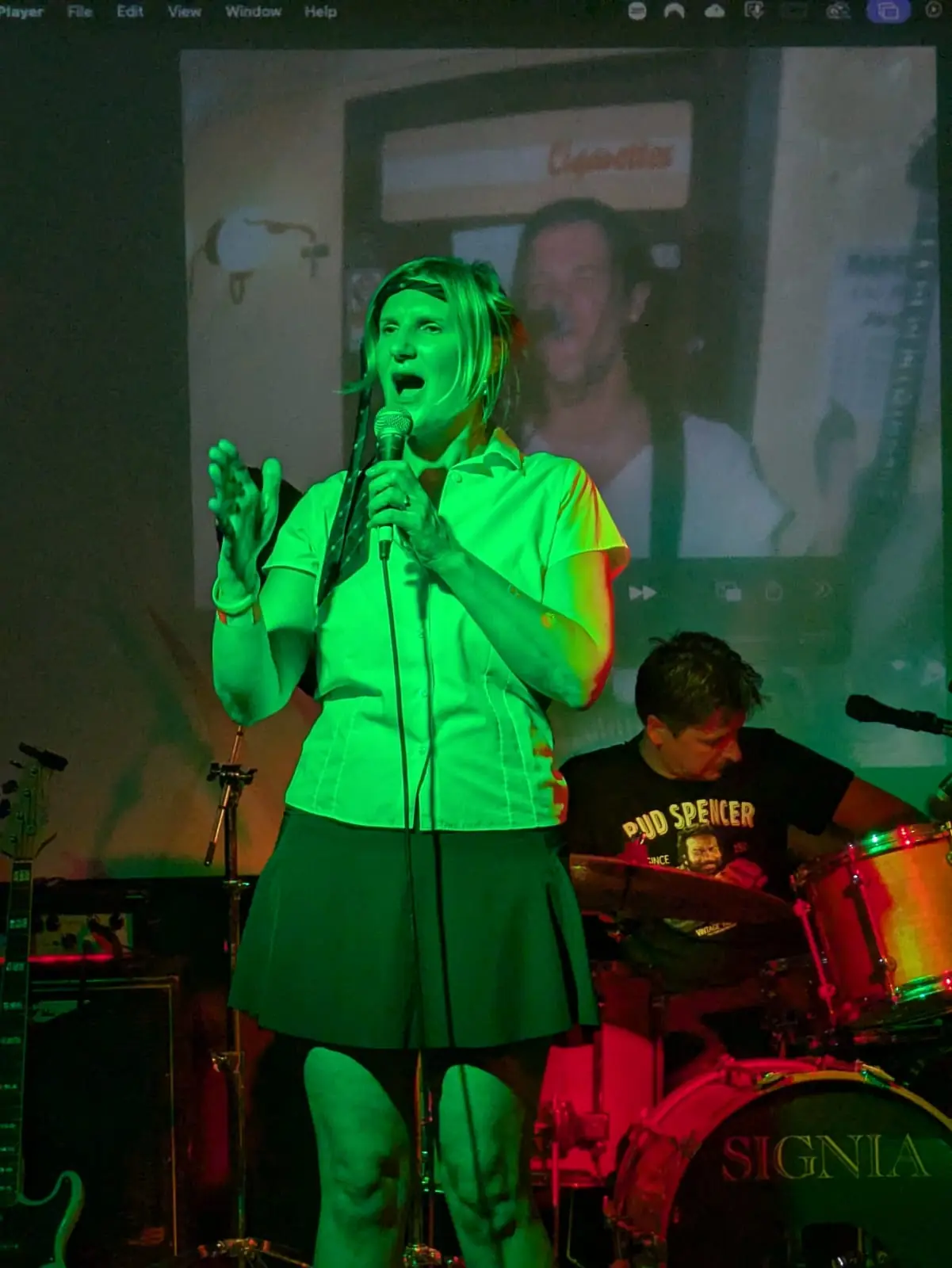 Suzie speaking with the crowd in front of Mitch’s Bitches